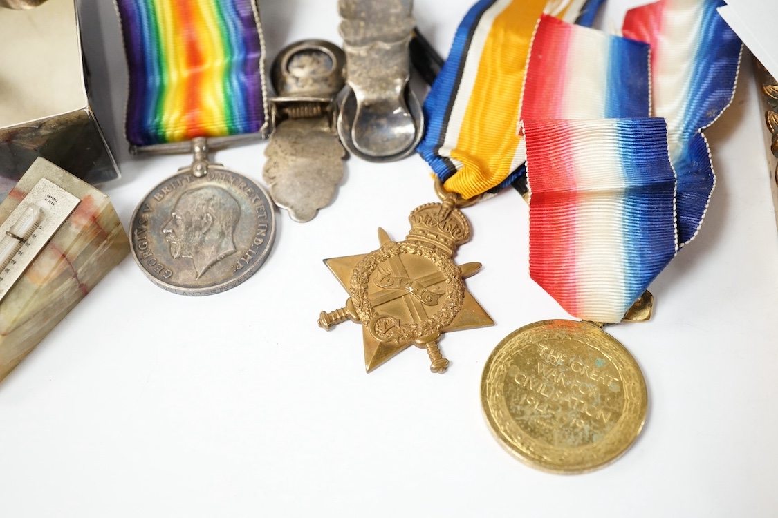 A First World War medal trio awarded to Lieut. W. Cleveland-Stevens. R.N.V.R., together with a miniature on ivory of a 19th century Captain with description to reverse, a signed military coloured engraving, a paper knife